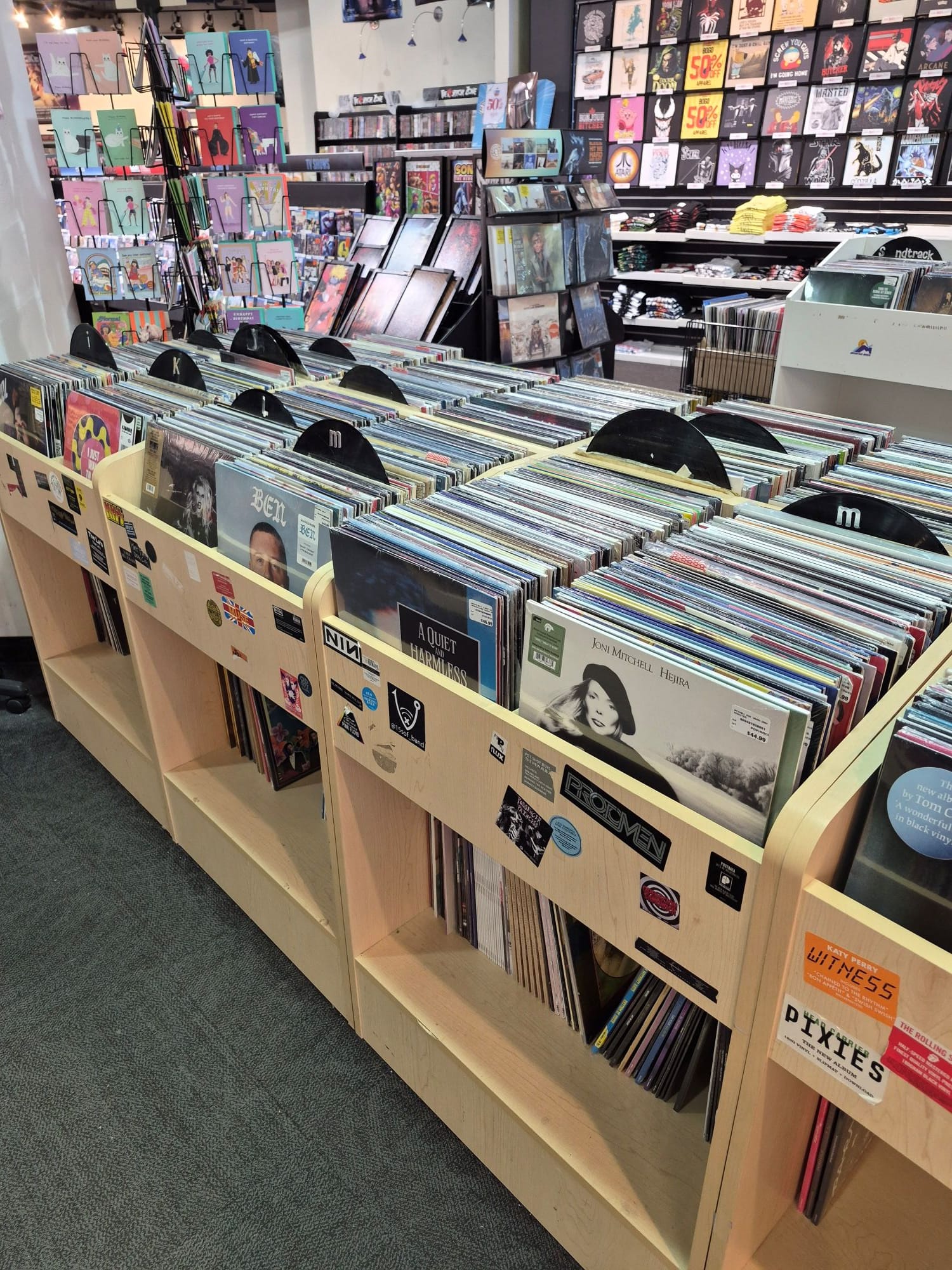 A picture of vinyl records at a record store.