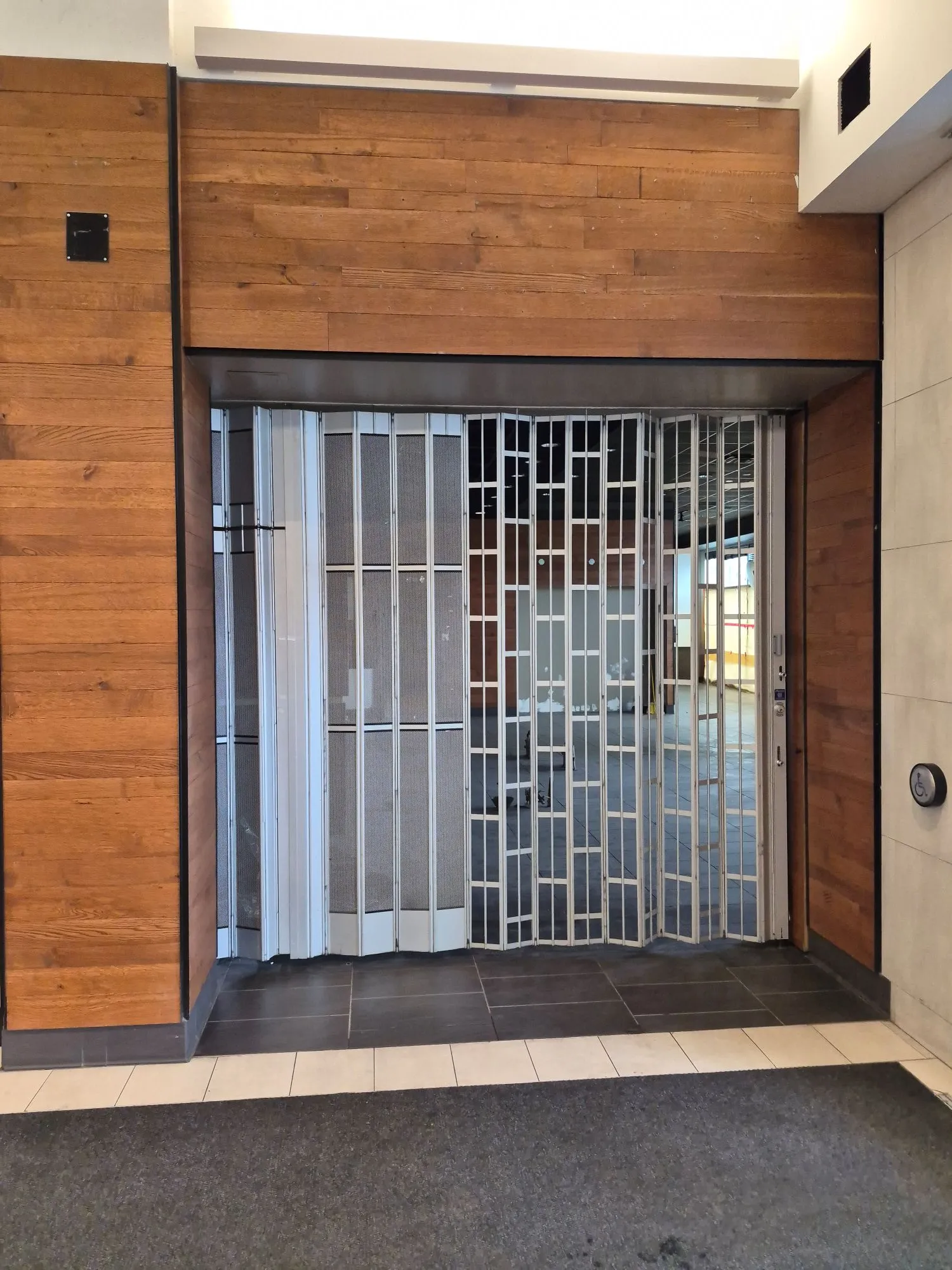 A photograph of a closed Starbucks location in a mall.